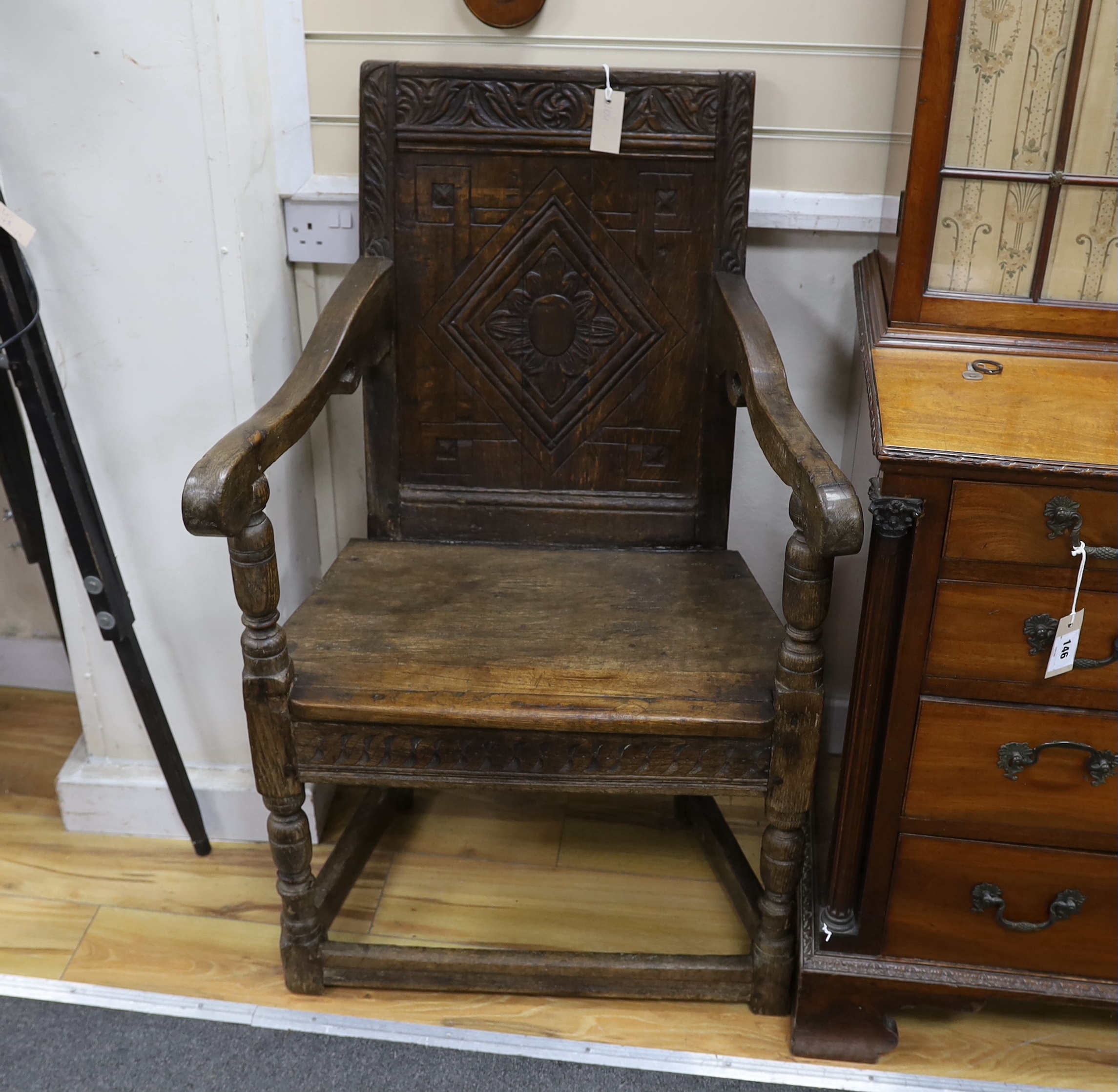 A 17th century and later oak Gainsborough chair, width 52cm, height 102cm